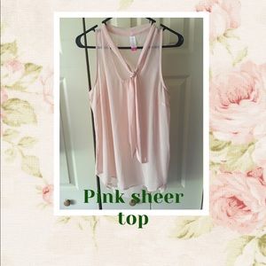 Light pink sleeveless tunic top